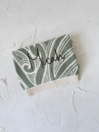 PREORDER Te aroha o te mātua - The love of a parent- Knitted pēpi blanket- sage green PREORDER