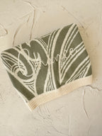 PREORDER Te aroha o te mātua - The love of a parent- Knitted pēpi blanket- sage green PREORDER
