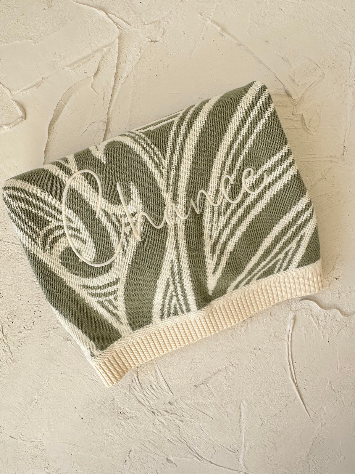 PREORDER Te aroha o te mātua - The love of a parent- Knitted pēpi blanket- sage green PREORDER