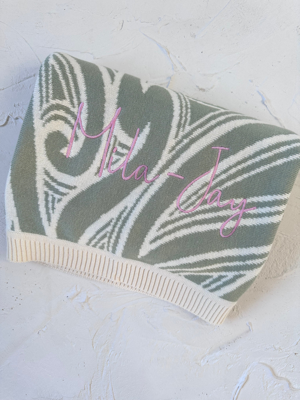 PREORDER Te aroha o te mātua - The love of a parent- Knitted pēpi blanket- sage green PREORDER