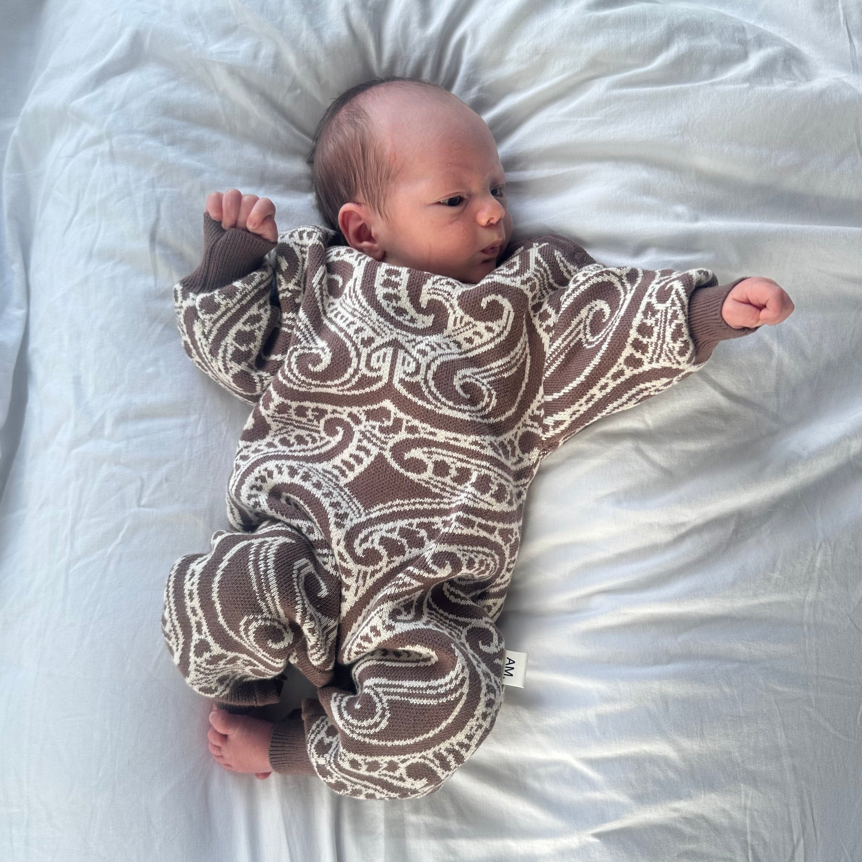Winter baby hooded romper - zip up Māori baby / pēpi romper | AwaMae