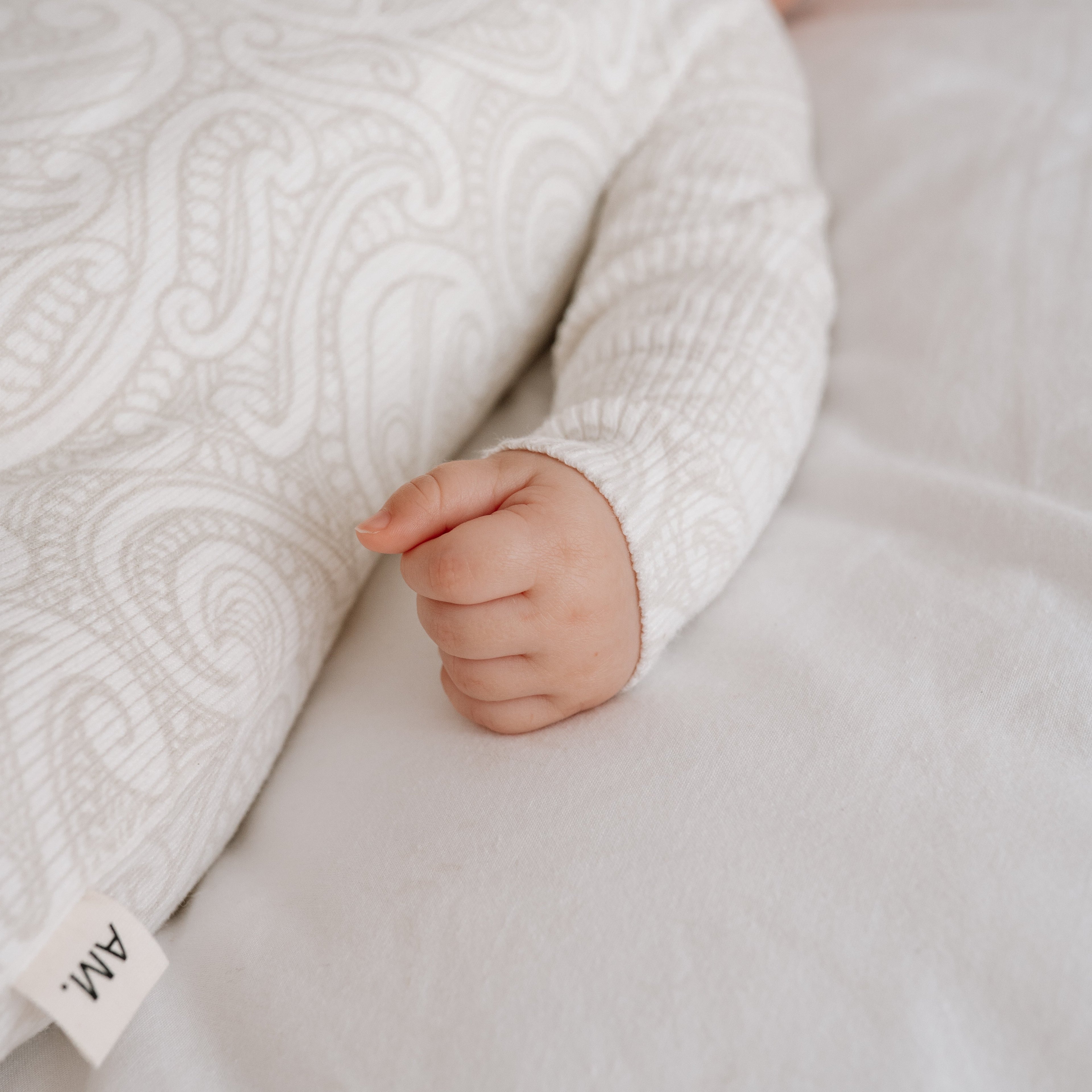 Basics ribbed knit Onesie- The wolf- oat milk.