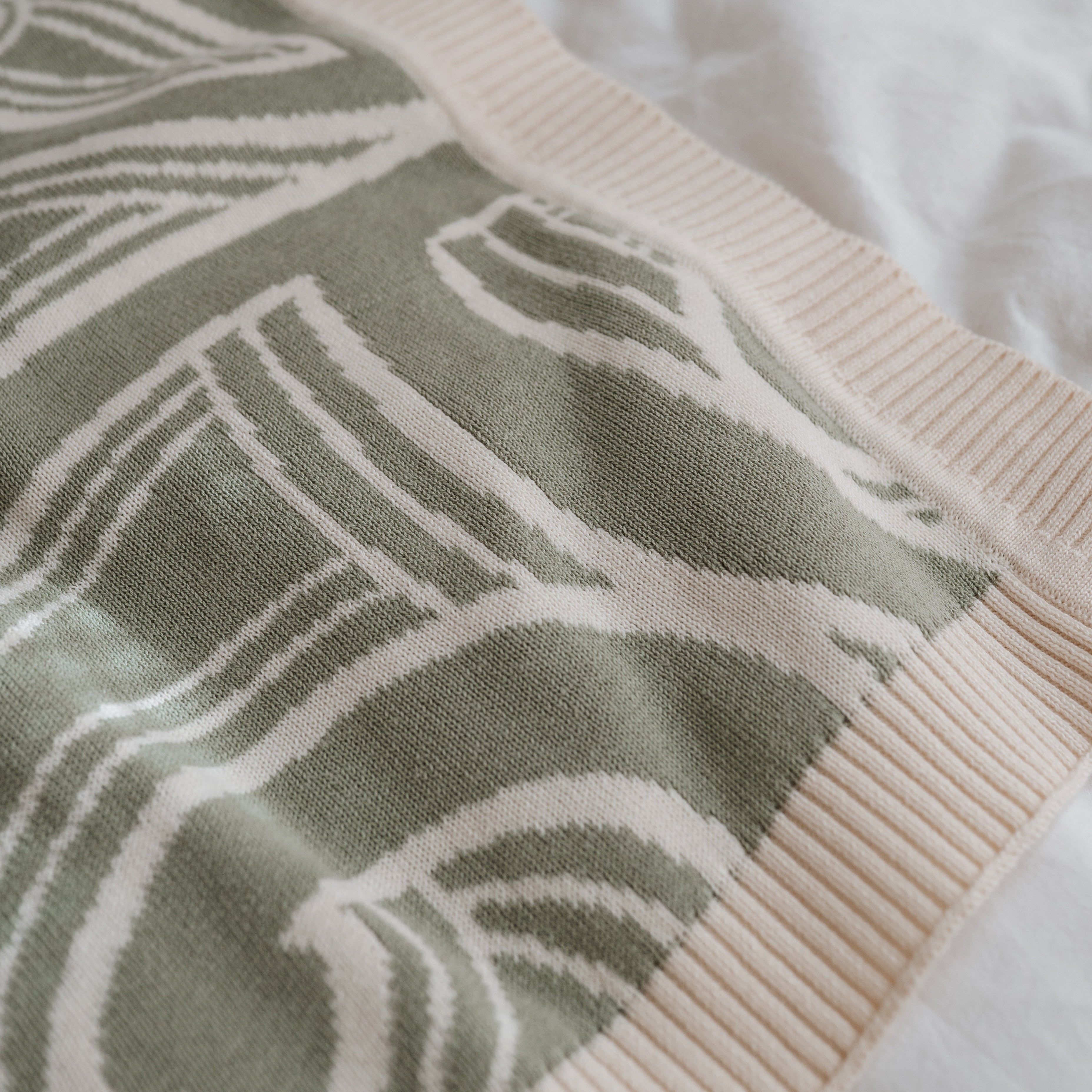 PREORDER Te aroha o te mātua - The love of a parent- Knitted pēpi blanket- sage green PREORDER
